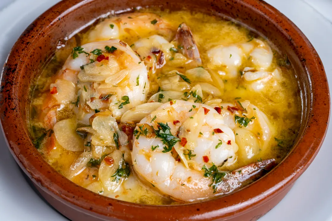 Gambas al ajillo, sizzling garlic shrimp at Los Gallegos Miami